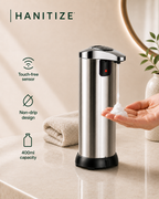 Stainless steel Hanitize touchless soap dispenser dispensing foam into a hand, with a non-drip design and 400ml capacity.